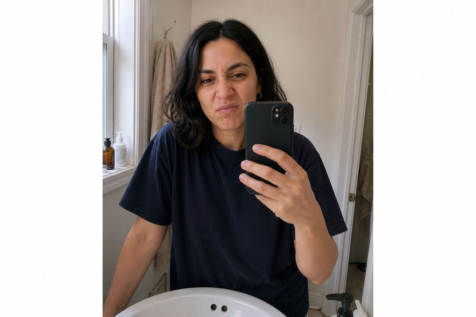 Brand A problem: same spokesperson grimacing at a phone in a bathroom